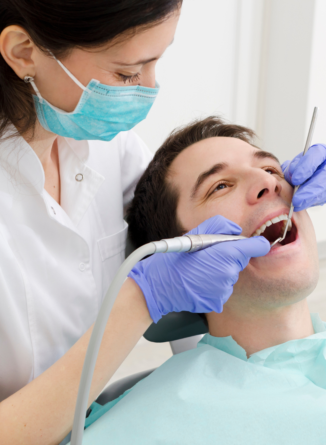 Dentist Cleaning Teeth